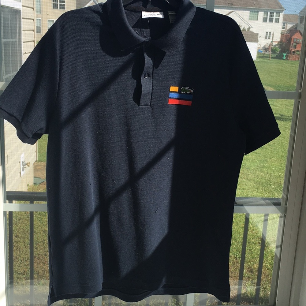 I am selling a Lacoste two button shirt🔥